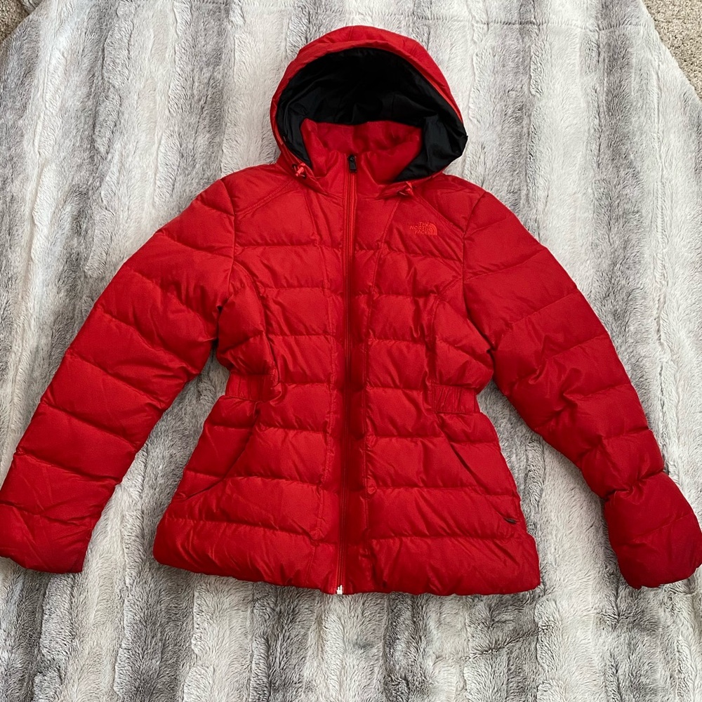 The North Face red puffer jacket
